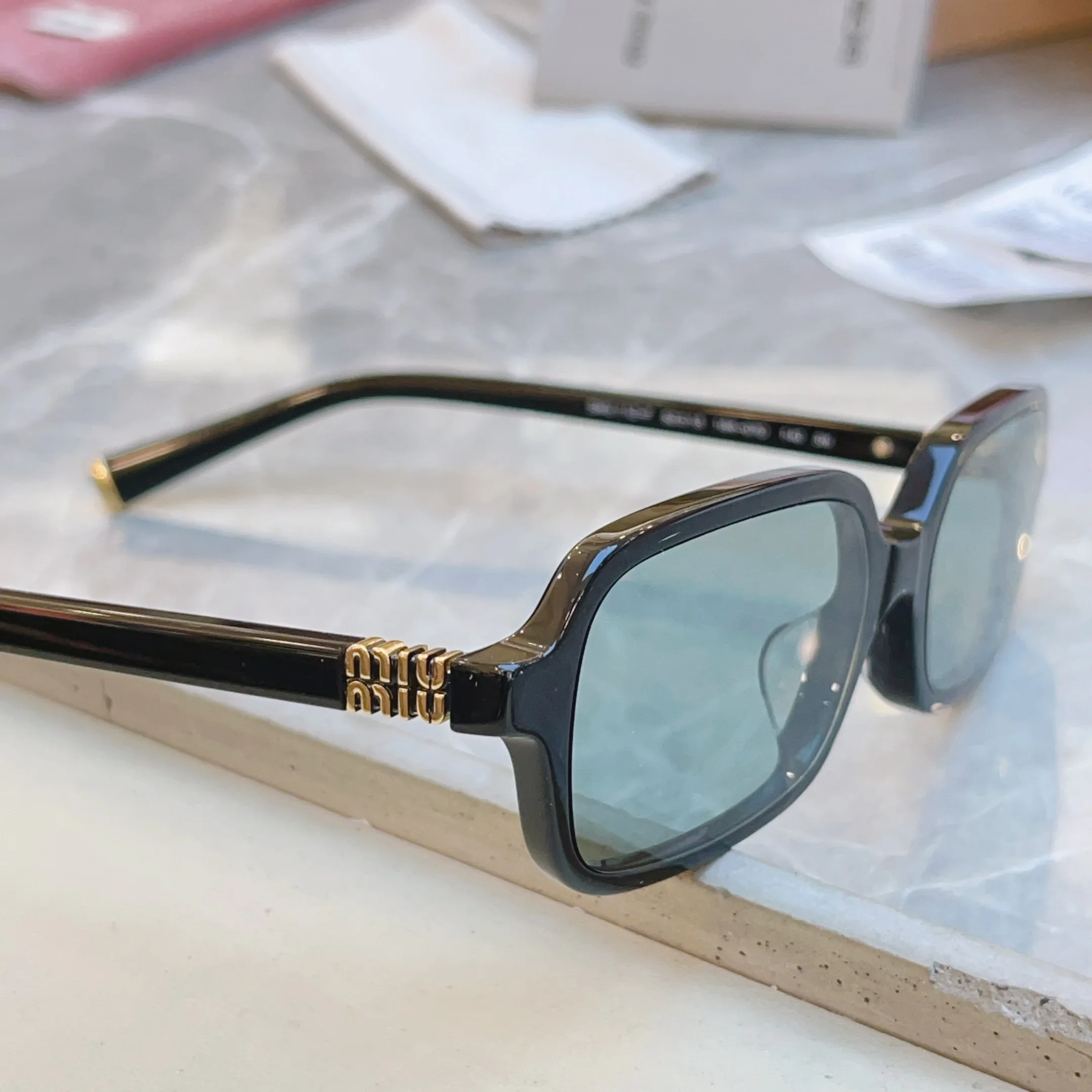 Glasses MIU MIU 17529369