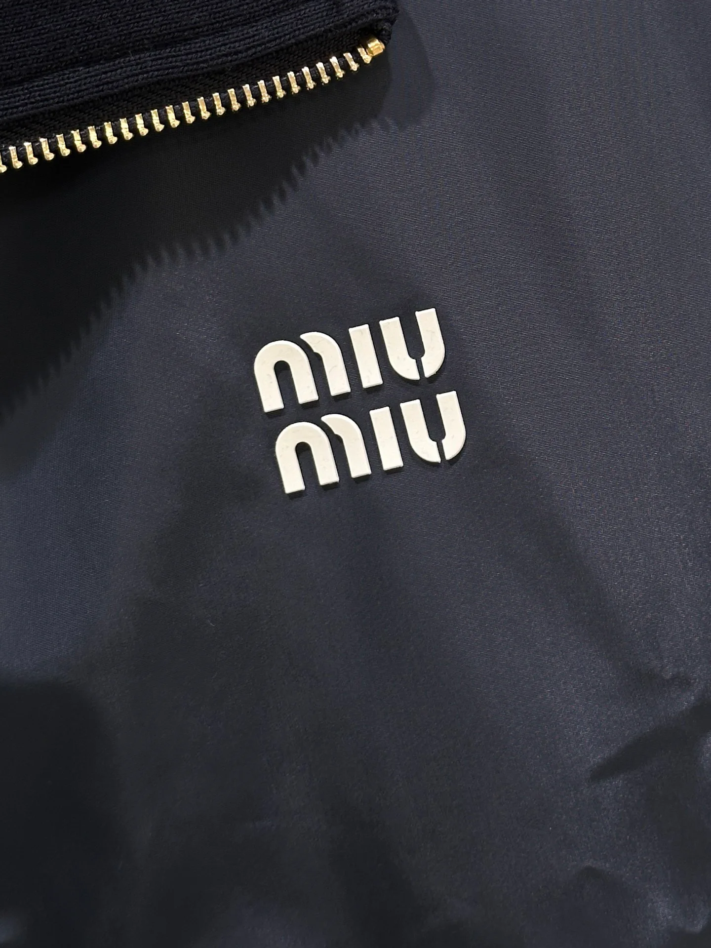 Women's Jackets And Down Jackets MIU MIU 18047639