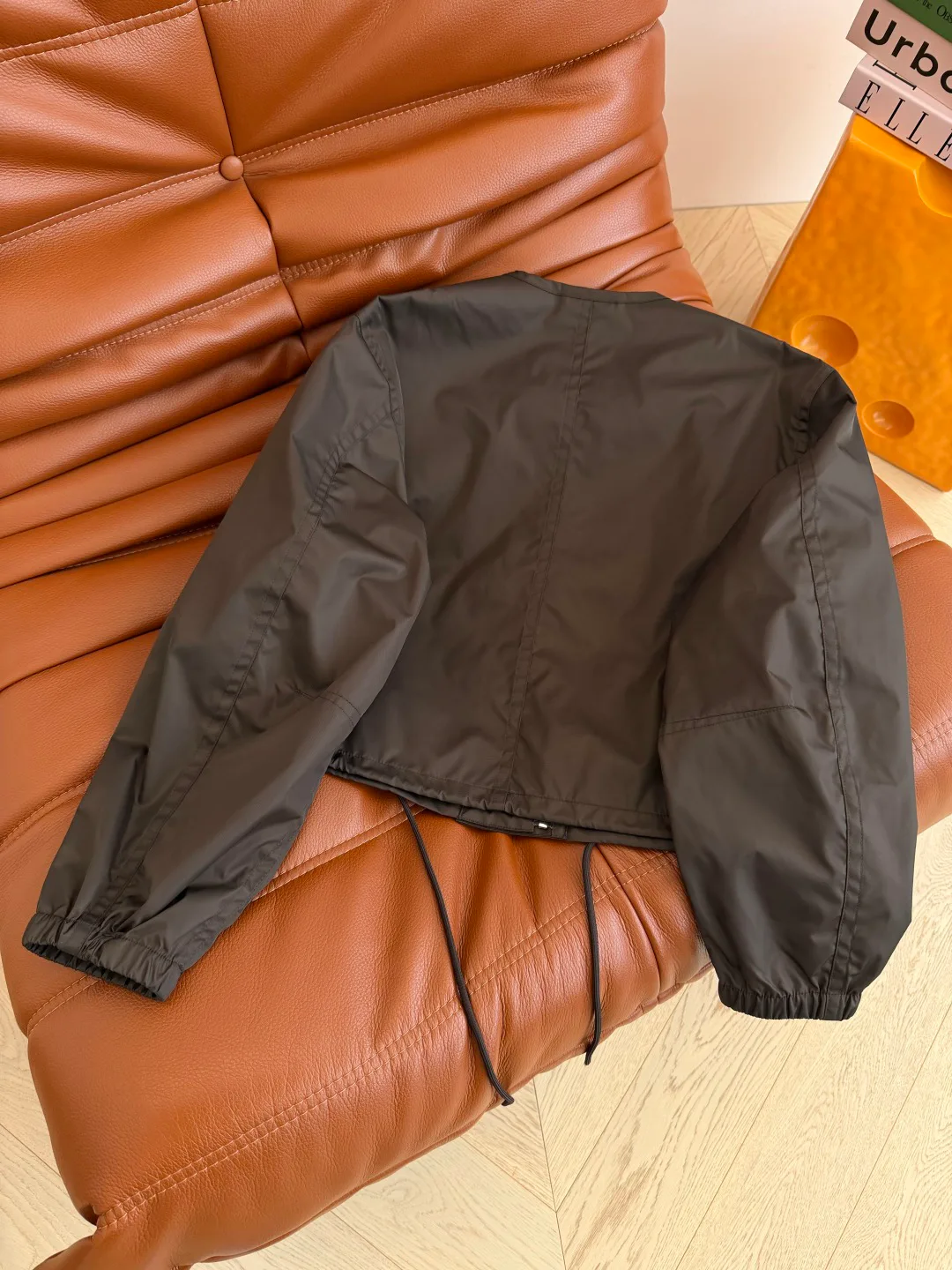 Women's Jackets And Down Jackets PRADA 18348092