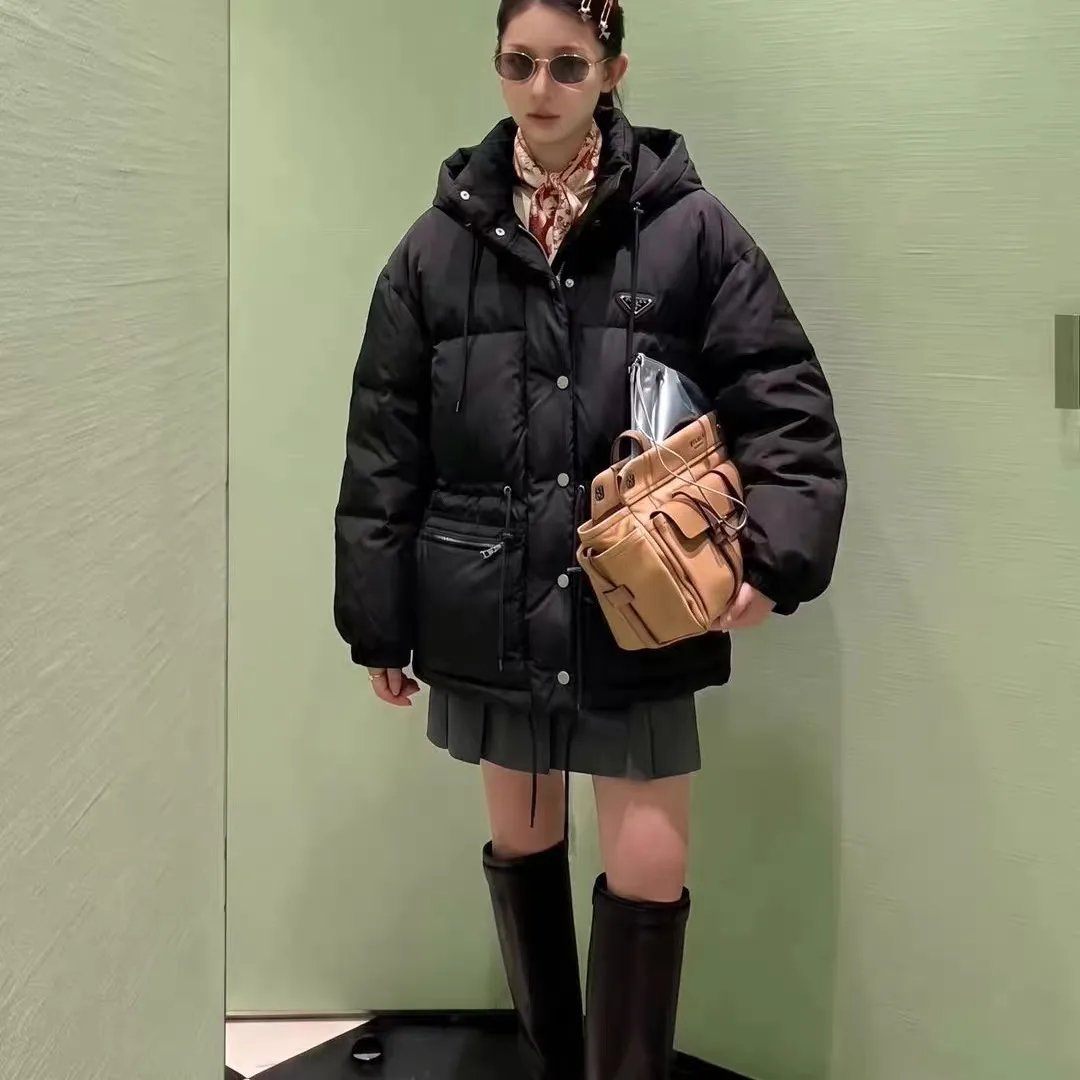 Women's Jackets And Down Jackets PRADA 18348170