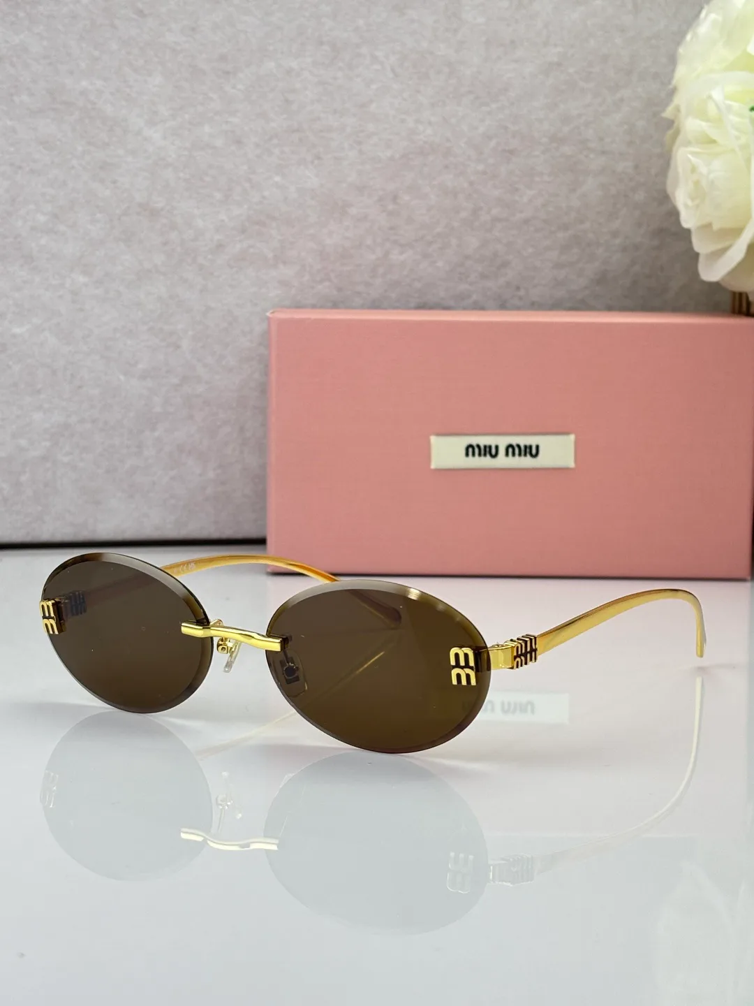 Glasses MIU MIU 18527878