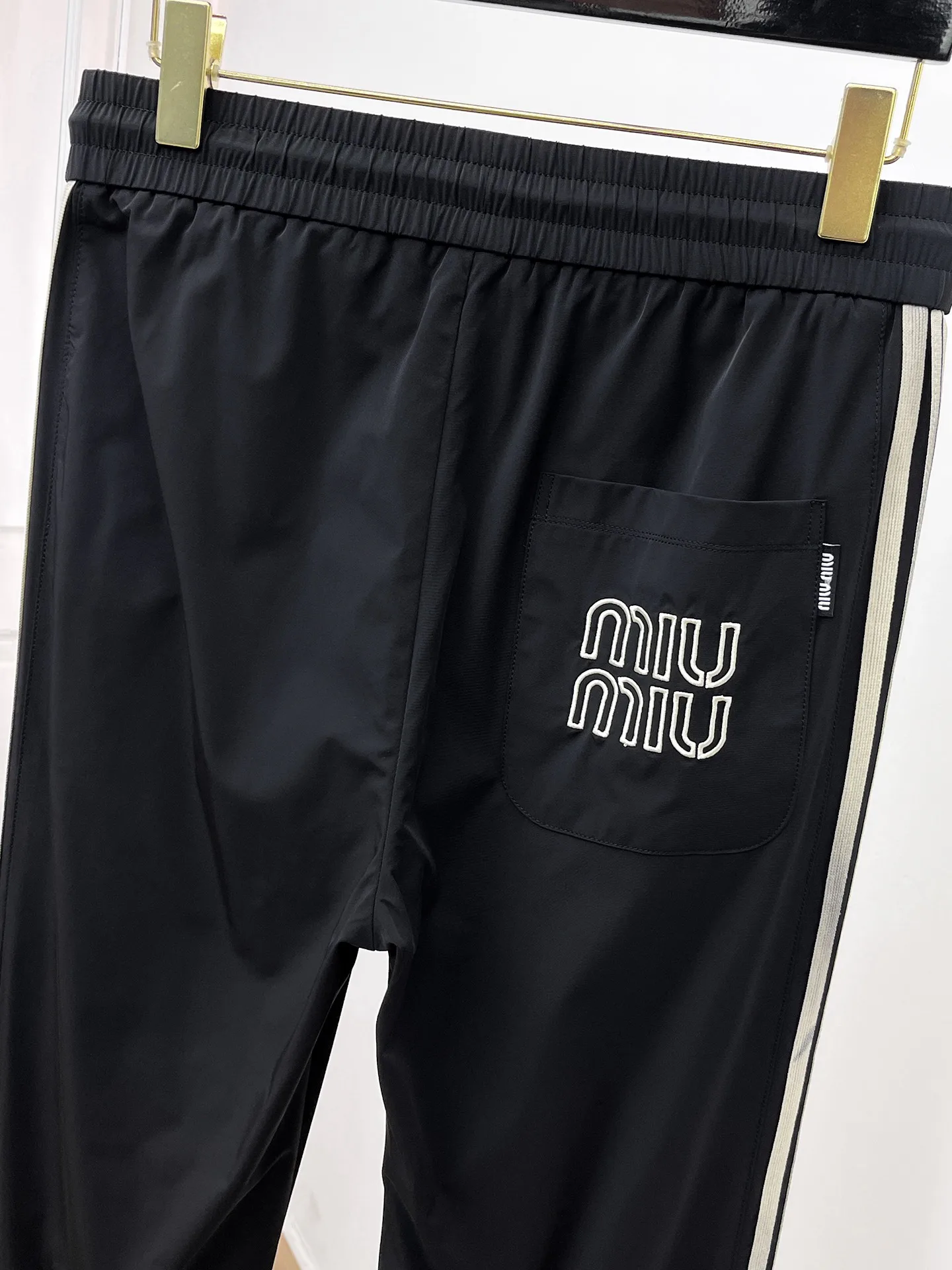 Men's Trousers MIU MIU 18399409