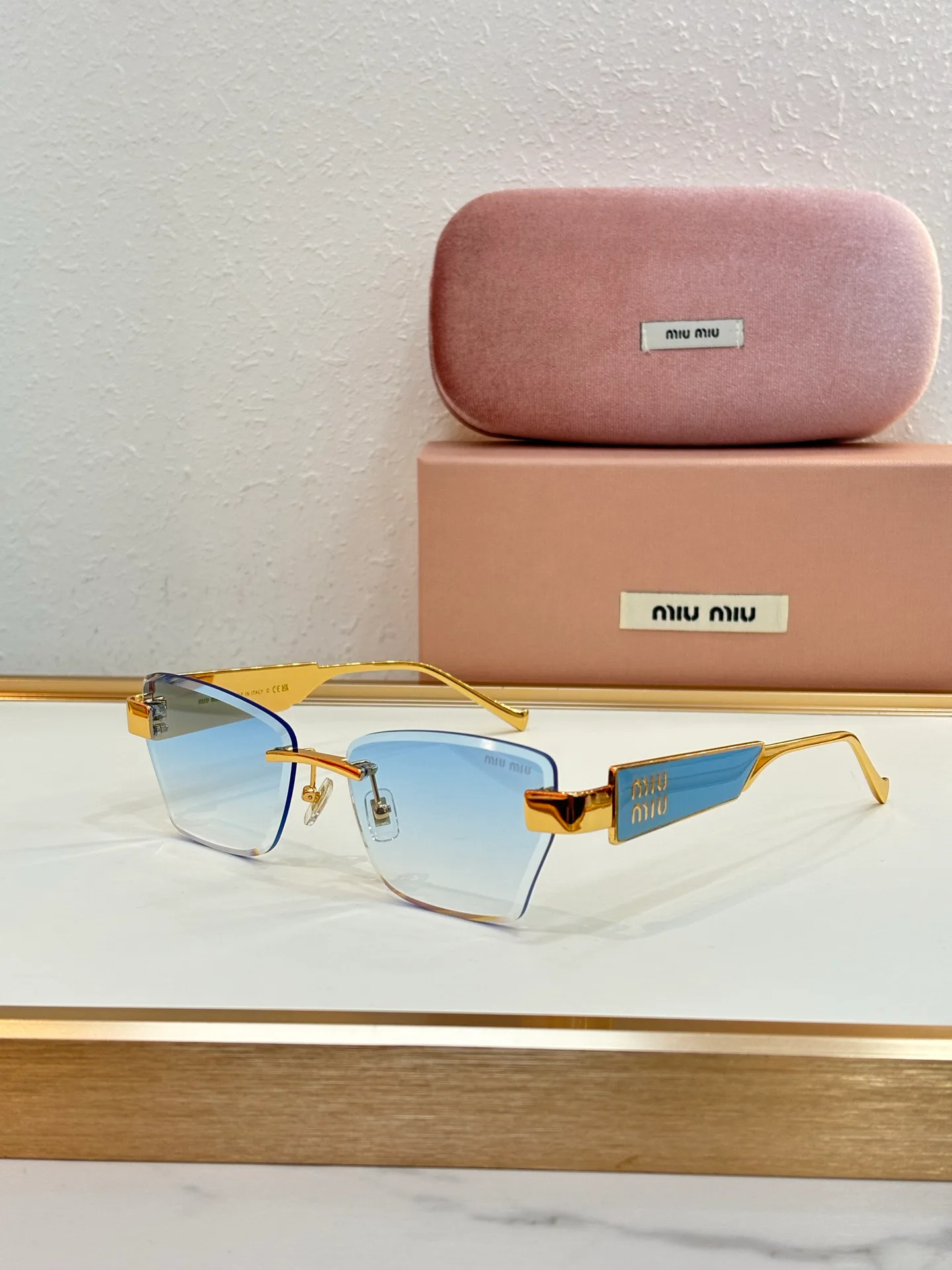 Glasses MIU MIU 18325670