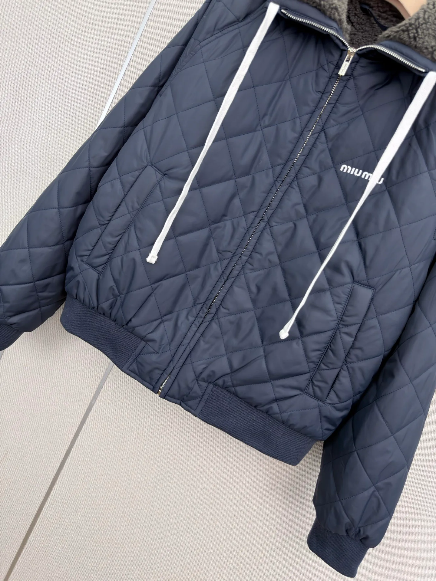 Women's Jackets And Down Jackets MIU MIU 18023482
