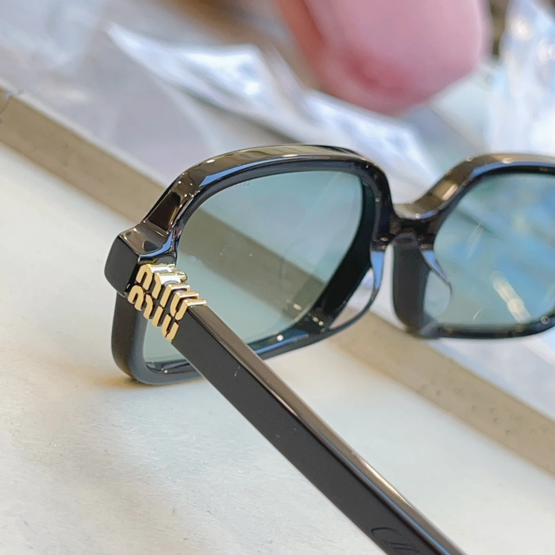 Glasses MIU MIU 17529369