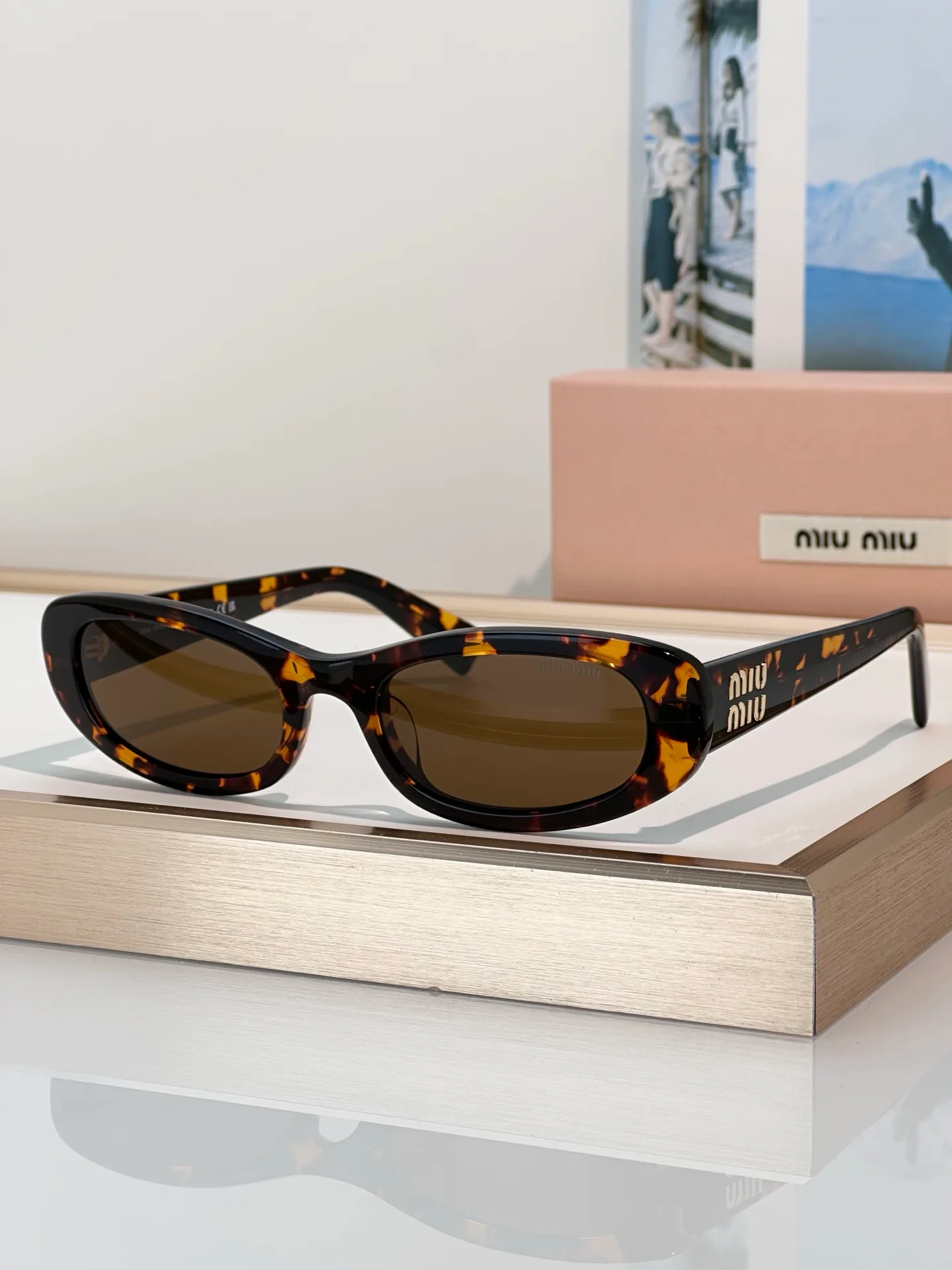 Glasses MIU MIU 17565424