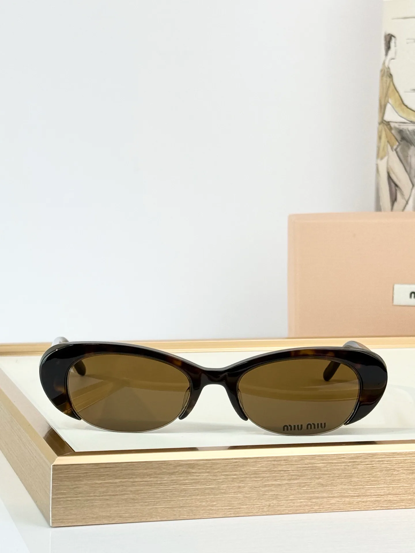 Glasses MIU MIU 18059896